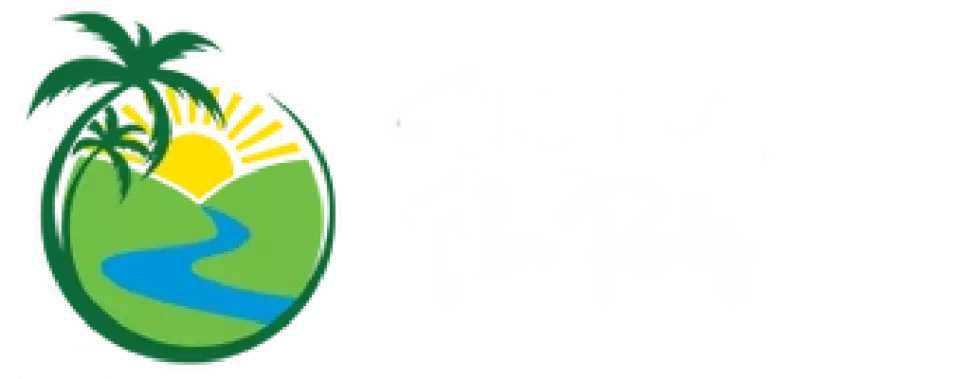 A circular logo features a serene river flowing through hills under a vibrant yellow sky, complemented by palm trees on the left. This captivating design blends seamlessly like expertly crafted graphics for Wordpress, ensuring your brand stands out with visual SEO appeal.